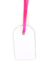 Blank gift tag with pink satin ribbon isolated on white