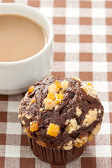 Chocolate orange muffin and coffee cup