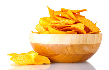tasty potato chips in wooden bowl isolated on white