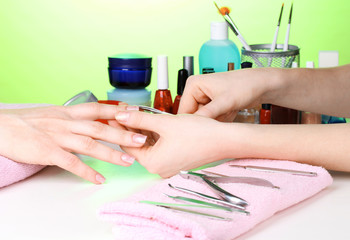 Obraz na płótnie Canvas Manicure process in beautiful salon