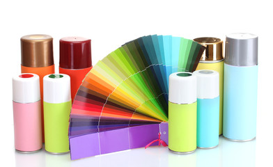aerosol cans and bright paper palette isolated on white