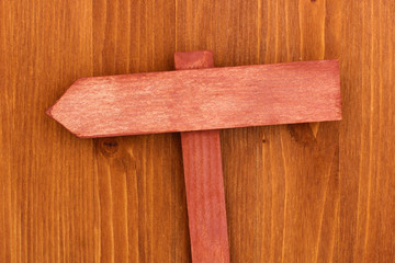 Color wooden sign board on wooden background