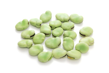 Broad beans on white background