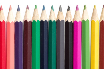 Many color pencils inline isolated on white