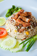 delicious fried rice with deep fried pork and vegetable
