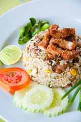 delicious fried rice with deep fried pork and vegetable
