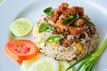 delicious fried rice with deep fried pork and vegetable
