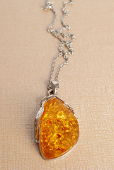 Silver pear amber pendant