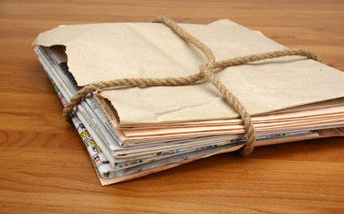 An image of big stack of newspapers