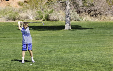 Young Teenage Golfer
