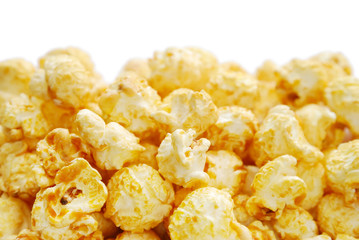 The heap of popcorn isolated on white background