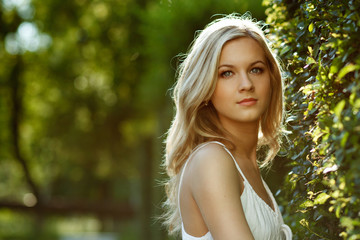 Naklejka premium Beautiful Blond Girl With Trees, White Dress