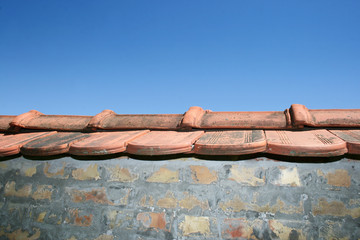 wall with roof tiles