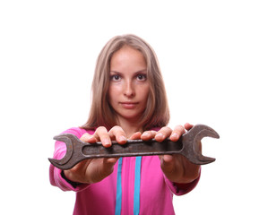 Young woman with wrench, isolated