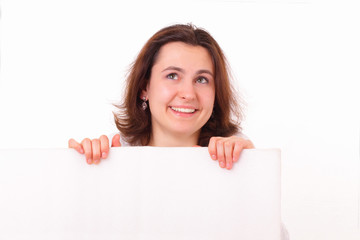Smiling young girl with a sheet of paper