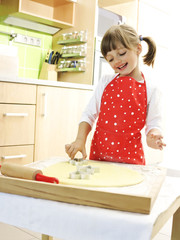 little girl baking in the kitchen