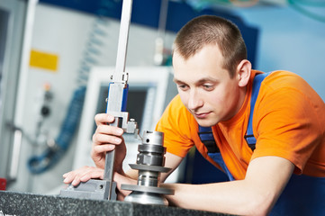 worker measuring cutting tool
