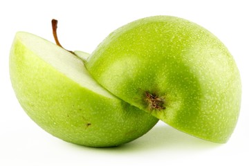 Sliced green apple with dew drops