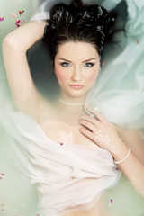 Beautiful woman in water