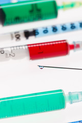 Many multicolor syringes, medical concept still life