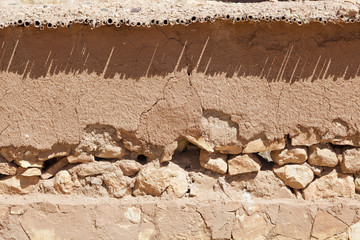Broken clay wall