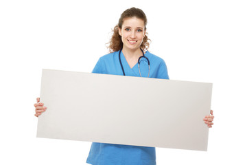 A female doctor holding a blank