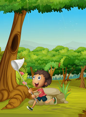 Boy running in a forest