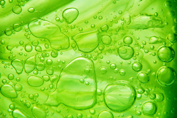Lime with bubbles on white