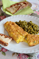 Cheese omelette and green peas