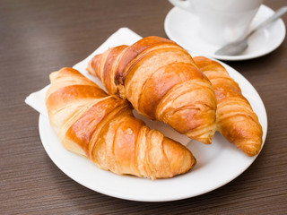fresh croissant on table ,Delicious!