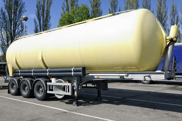 Tanker truck trailer parked on a forecourt