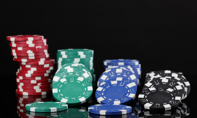 Casino chips isolated on black