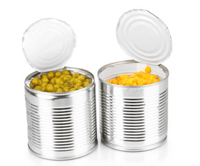 Open tin cans of corn and peas isolated on white