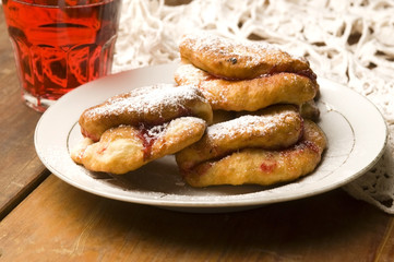 Sweet doughnuts with rose marmelade