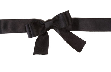black bow on ribbon isolated on white.