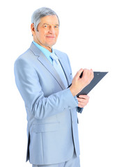 Nice businessman at the age, studying the work plan.