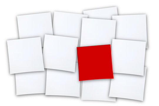 many white pieces of paper and one in red