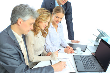 Fototapeta premium Beautiful businesswoman keeps the laptop. Isolated