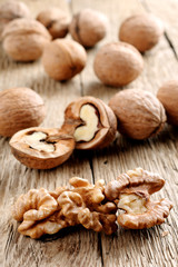 Walnuts on wooden background