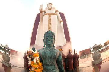 Twin standing outdoor buddha in Middle of Thailand. .
