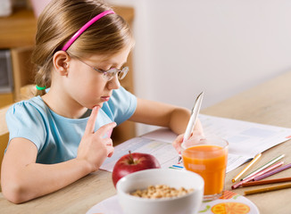 girl doing homework © mbt_studio