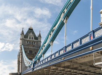 Fototapeta premium Low angle cropped shot of Tower Bridge, in London. The iconic br