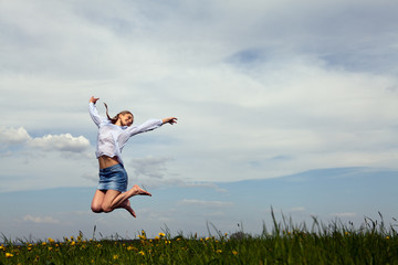 Fototapeta premium young woman is happy outdoor in summer