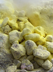 Sulphur yellow stones, volcano, Indonesia © teabum