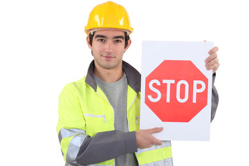 Worker with stop sign