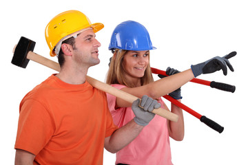 Two builders pointing