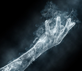 female hand from a smoke