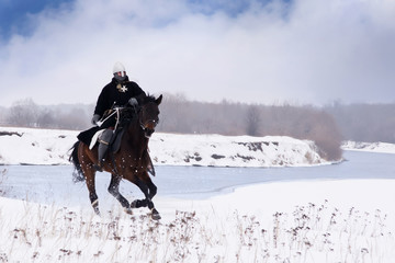 Medieval knight of St. John (Hospitallers) on a horse