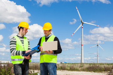 Two Engineers in a Wind Turbine Power Station