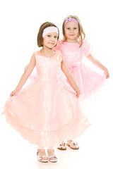 Fototapeta na wymiar Two friends in a pink dress
